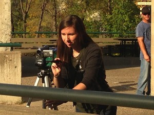 Kristy Crouse filming Japanese macaques at the Minnesota Zoo
