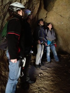 Team in cave looking up